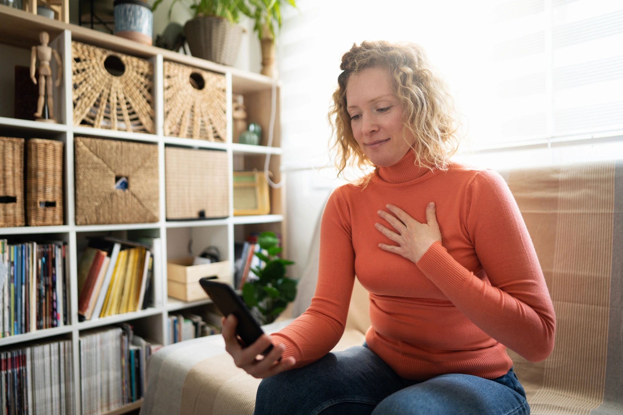 Female patient having a video call with doctor on mobile phone